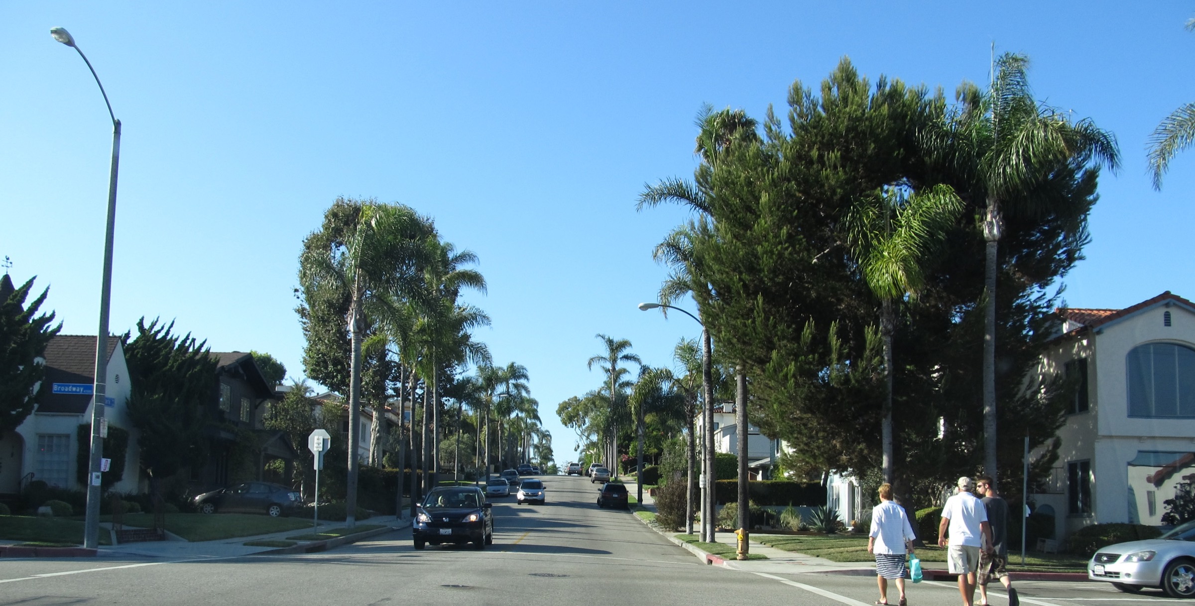 A palm-lined residential street off Broadway in Belmont Heights, Long Beach